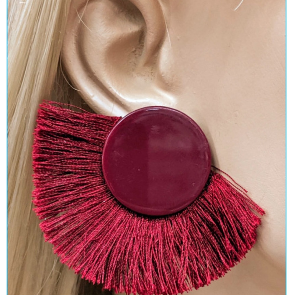 Burgundy button earrings.